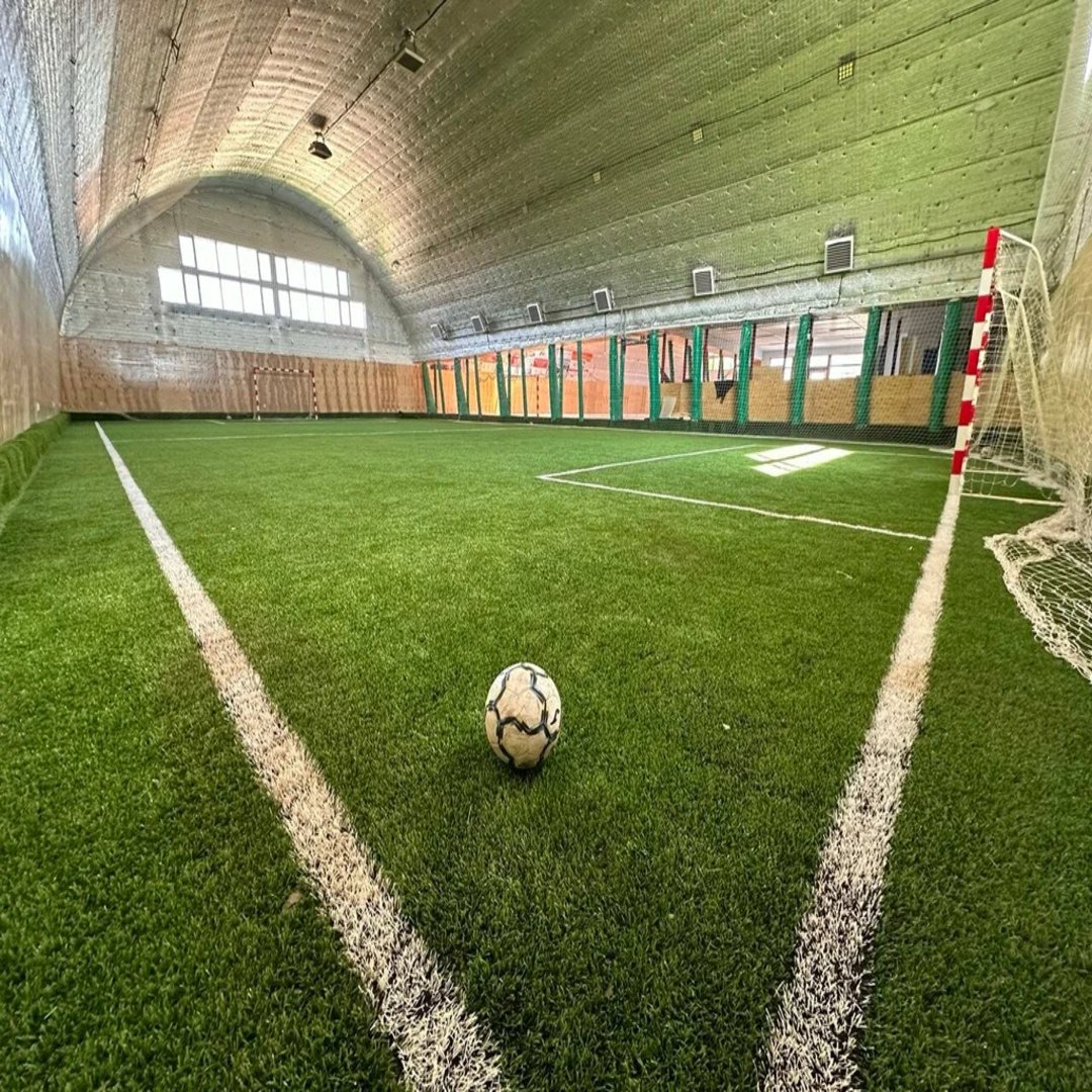 Modern sports club interior with fitness equipment